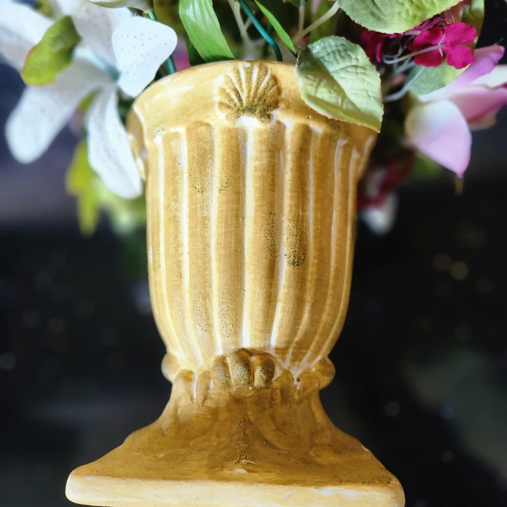 Beautiful faux flowers in vase